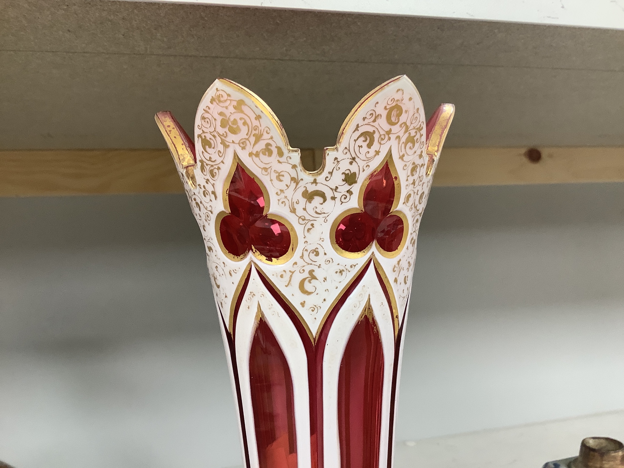 A Bohemian overlaid ruby glass vase, 31cm